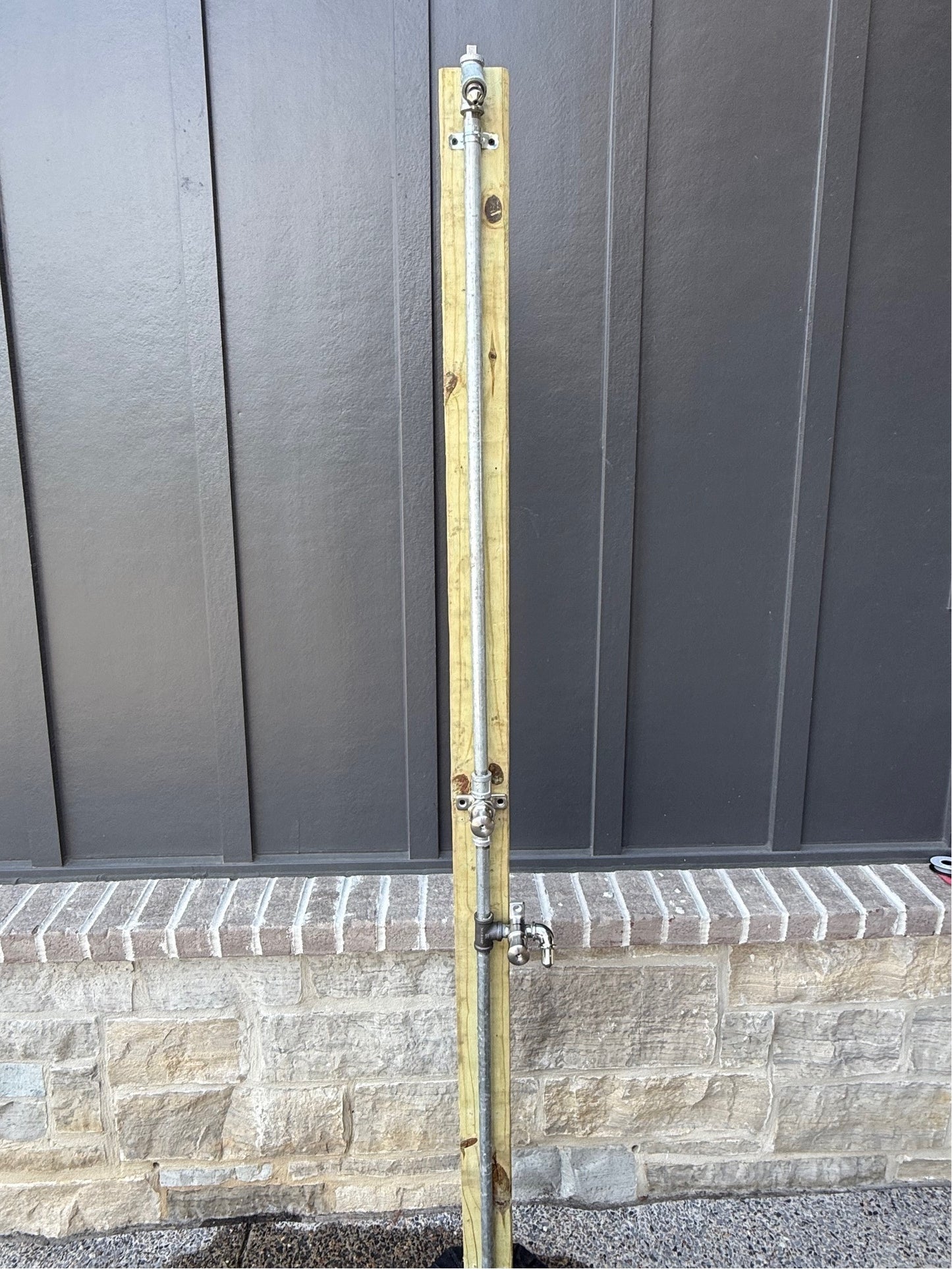 Outdoor shower with foot wash